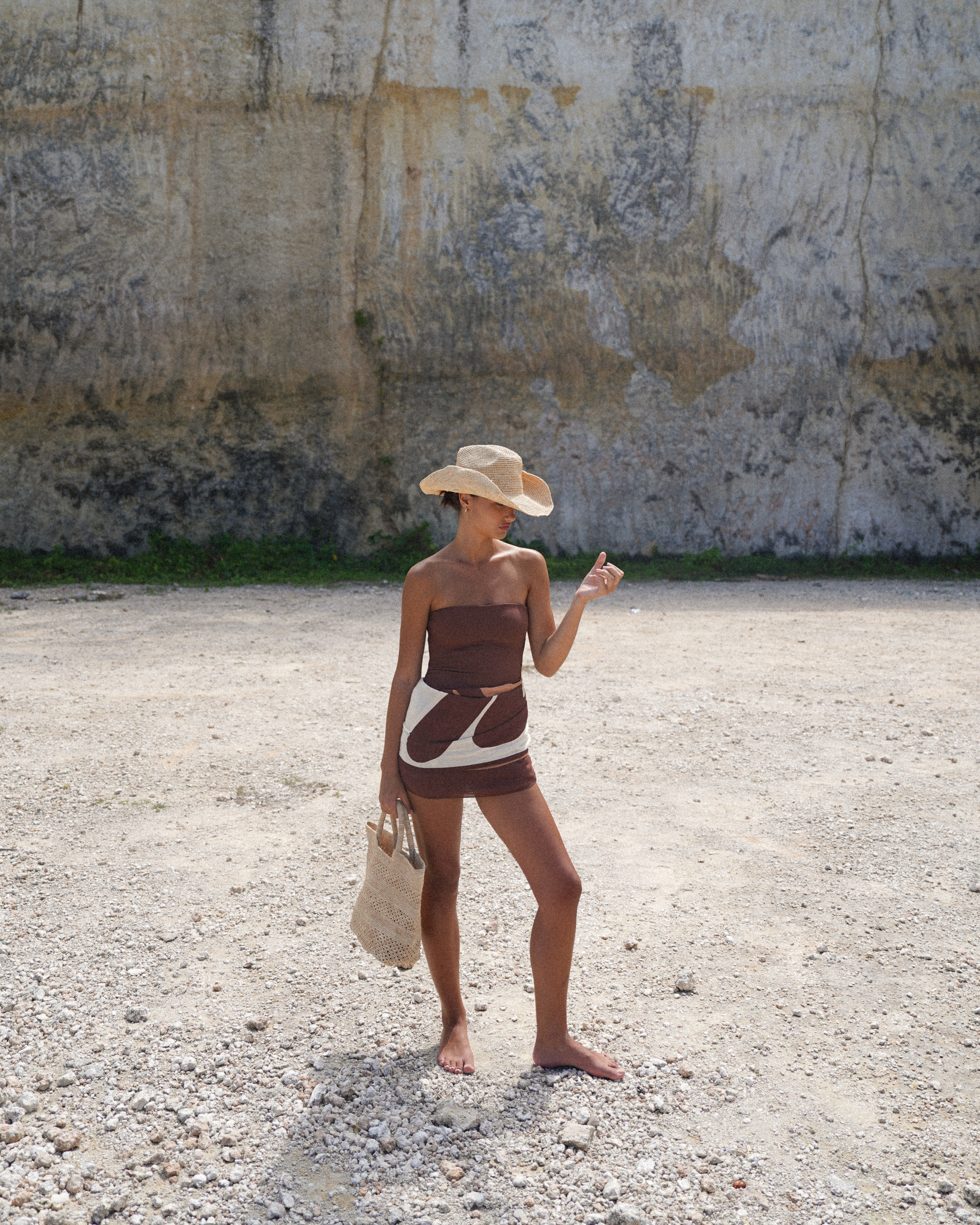 Handwoven natural raffia cowboy hat for women, wide brim sun hat perfect for beach days and resort outfits.