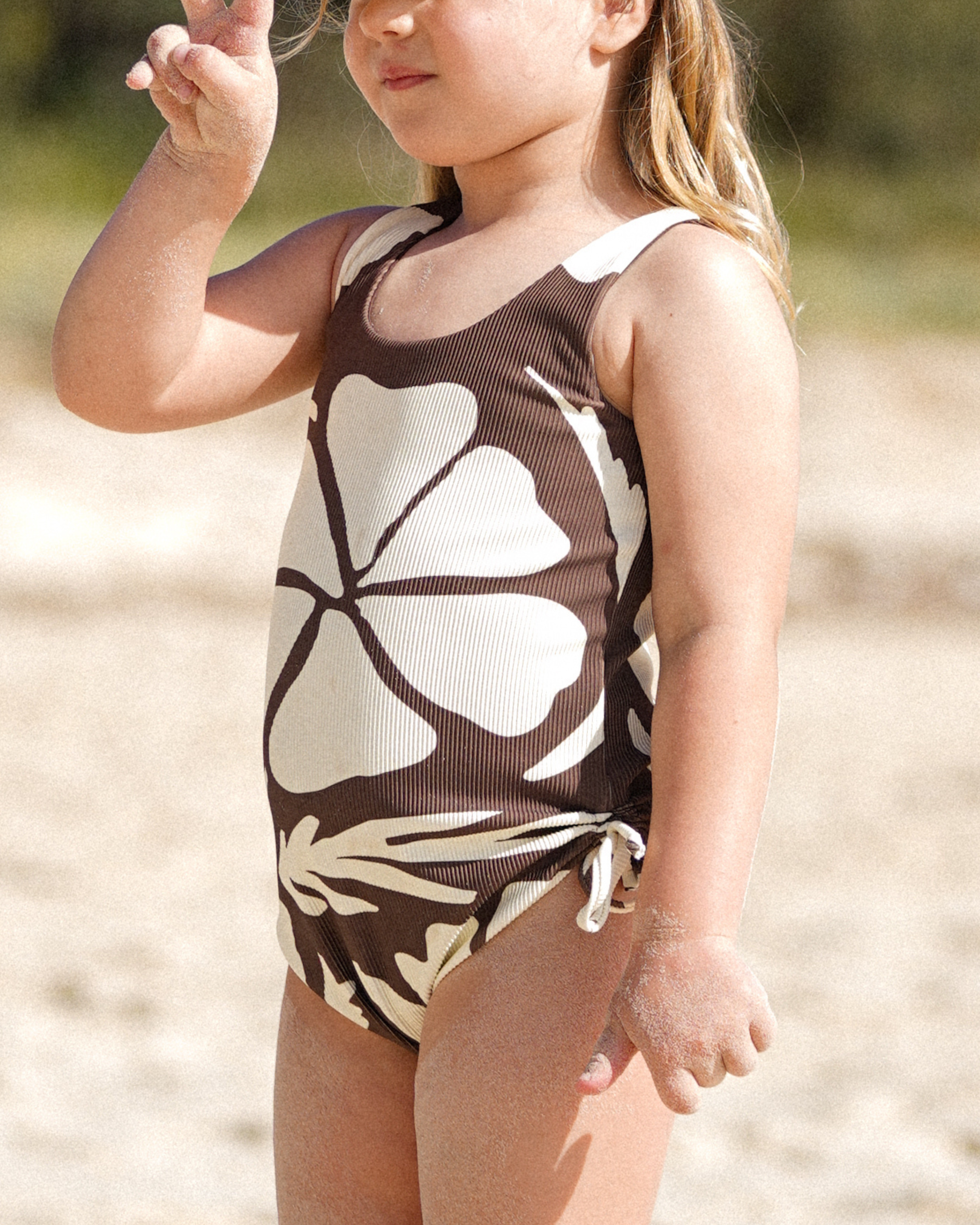 Children’s rib brown floral swimsuit by Ochre Lane, side-tie one piece