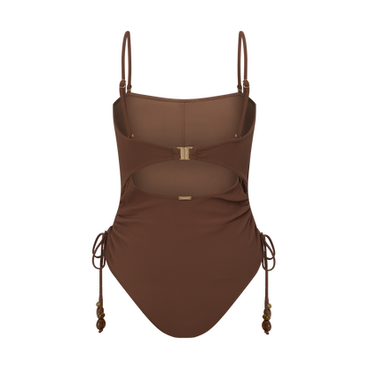 Women’s ribbed one piece in dark brown with flattering ruched sides, side ties, and curve-hugging fit.