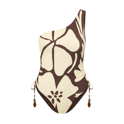 One shoulder floral print one piece swimsuit in chocolate and cream with ruched side ties and high-cut leg.