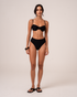 Ochre Lane Ruched Soft Cup Bralette bikini top in black rib with sculpting rib fabric and soft-cup support