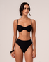 Ochre Lane Splice Mid Rise bikini bottom in black rib with a mid-rise sculpting fit, luxury Australian swimwear