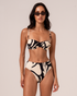 Botanica print ruched bandeau bralette in black and cream with high-waist bikini bottom, front view studio shot