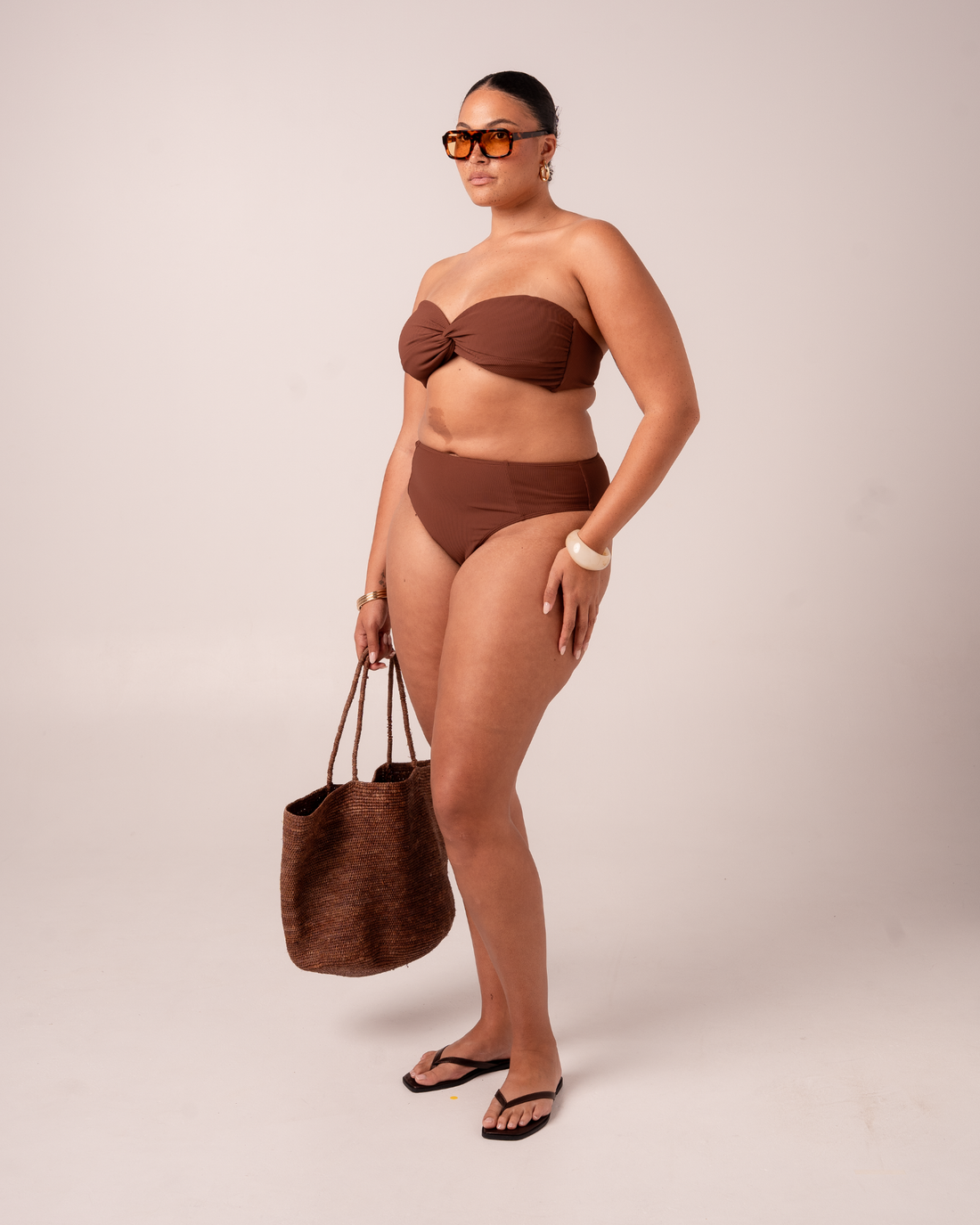 Ochre Lane Bandeau Twist bikini top in chocolate brown rib with supportive twist-front detail and sculpting rib fabric