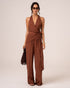 Front view of a chocolate brown halter wrap top showing the plunging V-neckline and side waist tie