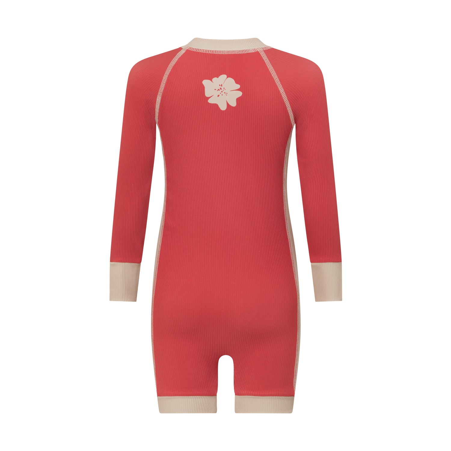 Back view of a coral melon kids surf suit showing the cream flower graphic between the shoulders and contrast cuffs