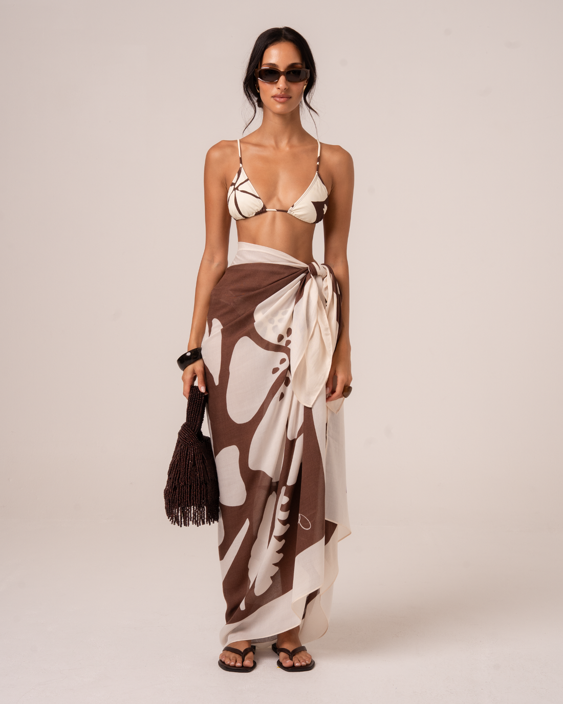 Ochre Lane Ibisco Sarong, a lightweight brown floral beach cover-up for resort wear
