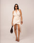 Ivory halter wrap mini dress with a plunging halter neckline and wrapped bodice, shown from the front