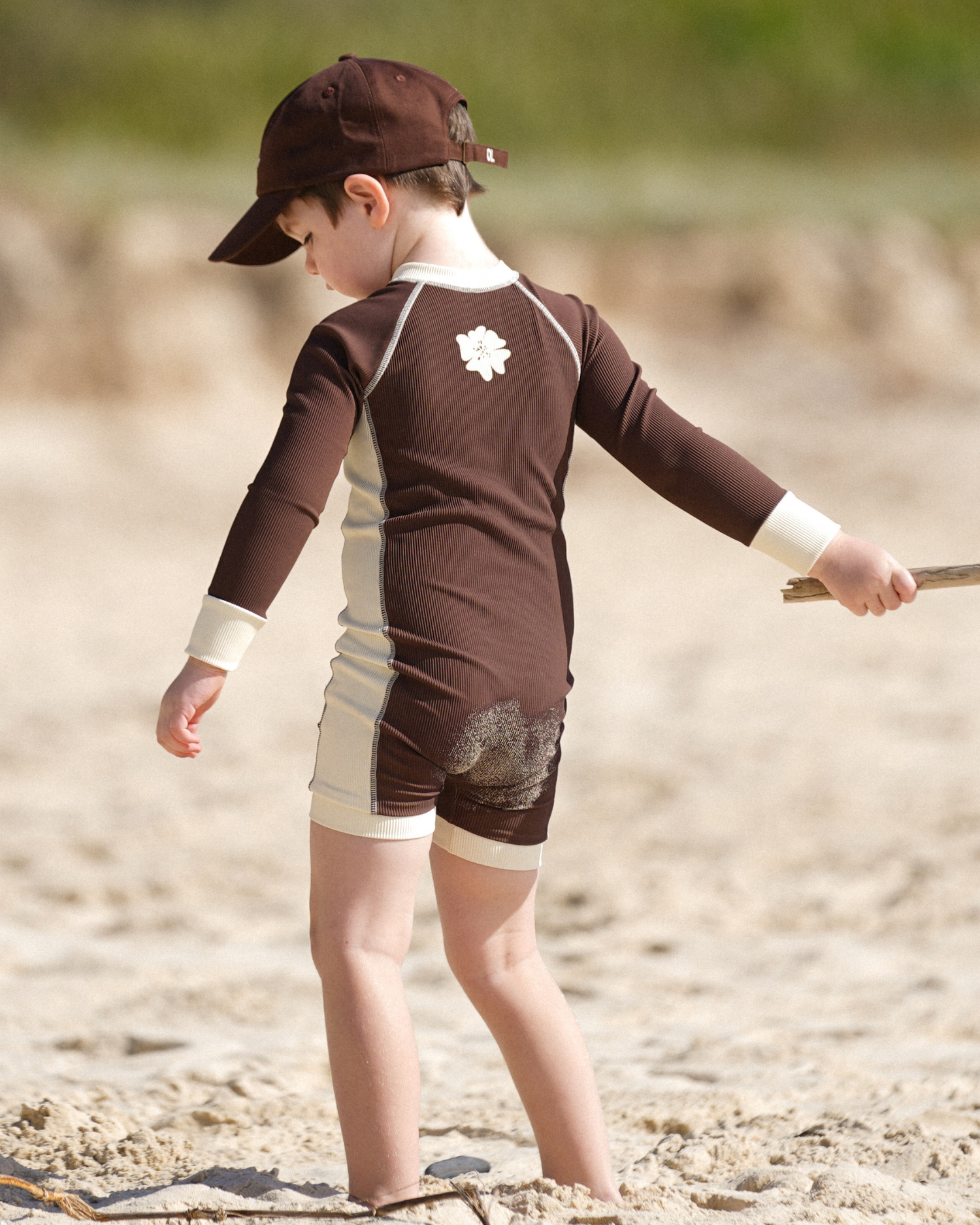 Kids rib chocolate long-sleeve surfsuit for sun protection by Ochre Lane