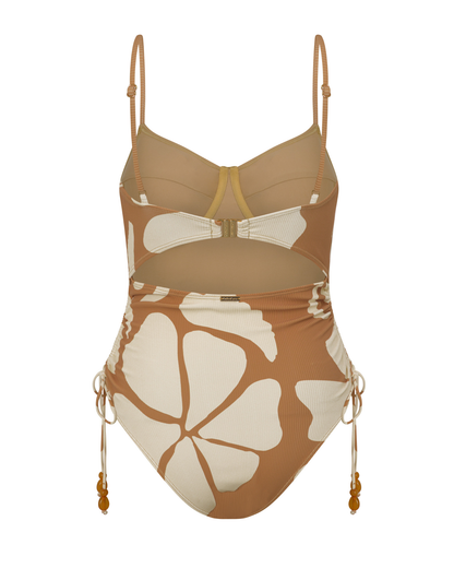 Flat lay of the Sienna one piece swimsuit with thin straps and floral ribbed fabric, styled with Ochre Lane accessories.